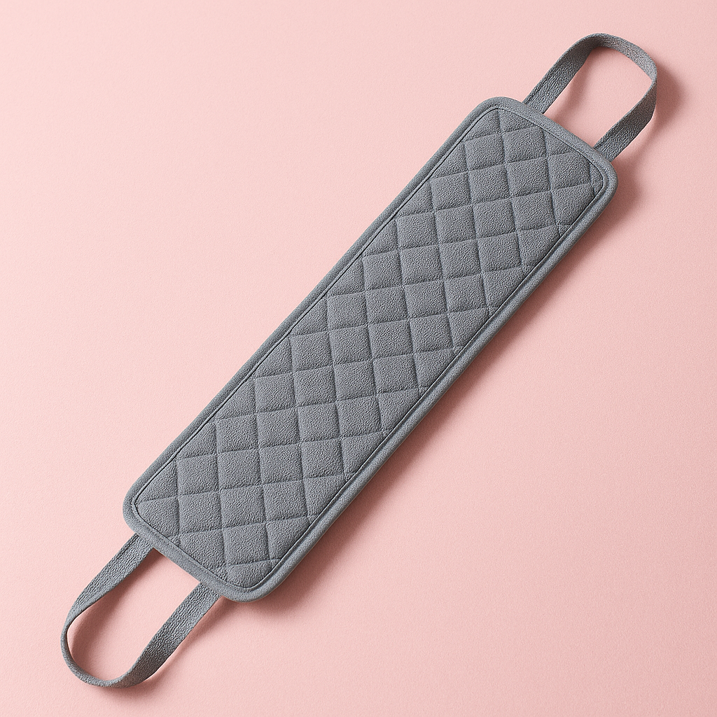 Gray quilted oven mitt on a pink background