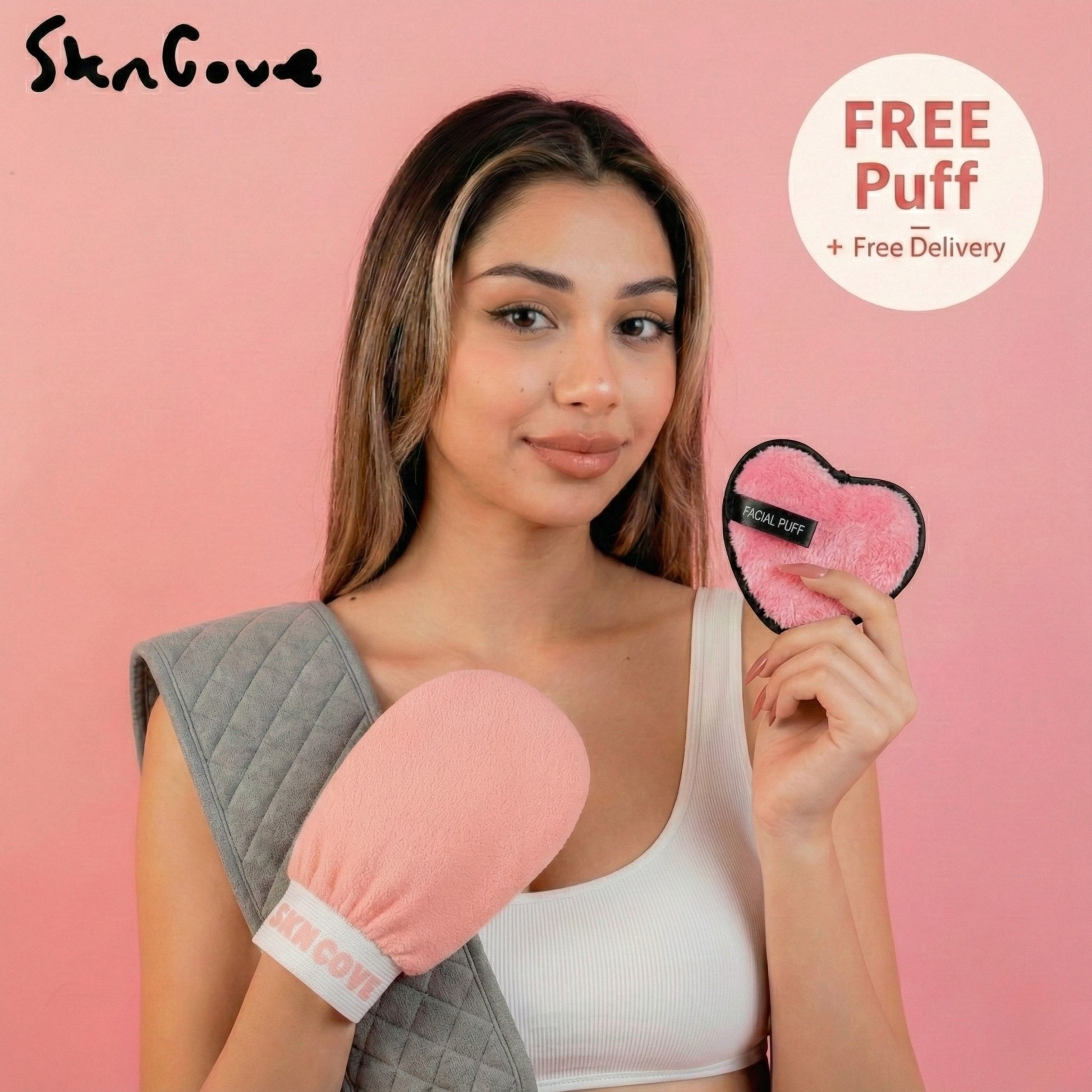 Woman holding a pink and gray skin care tool with a free puff offer on a pink background.