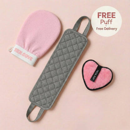 Gray scrubber, pink mitt, and heart-shaped puff on a pink background with 'Red Cow' branding.