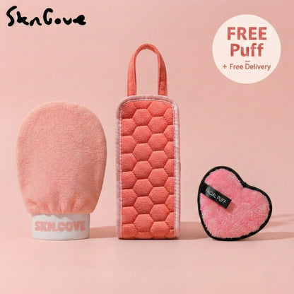Three pink skincare tools with 'SkinGlove' branding on a pink background