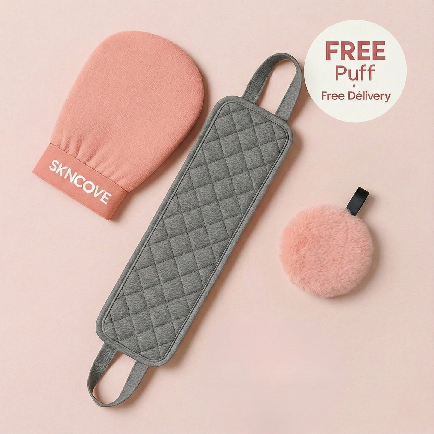 Gray textured paddle, pink mitt, and pink puff on a beige background with 'SKNCove' branding.
